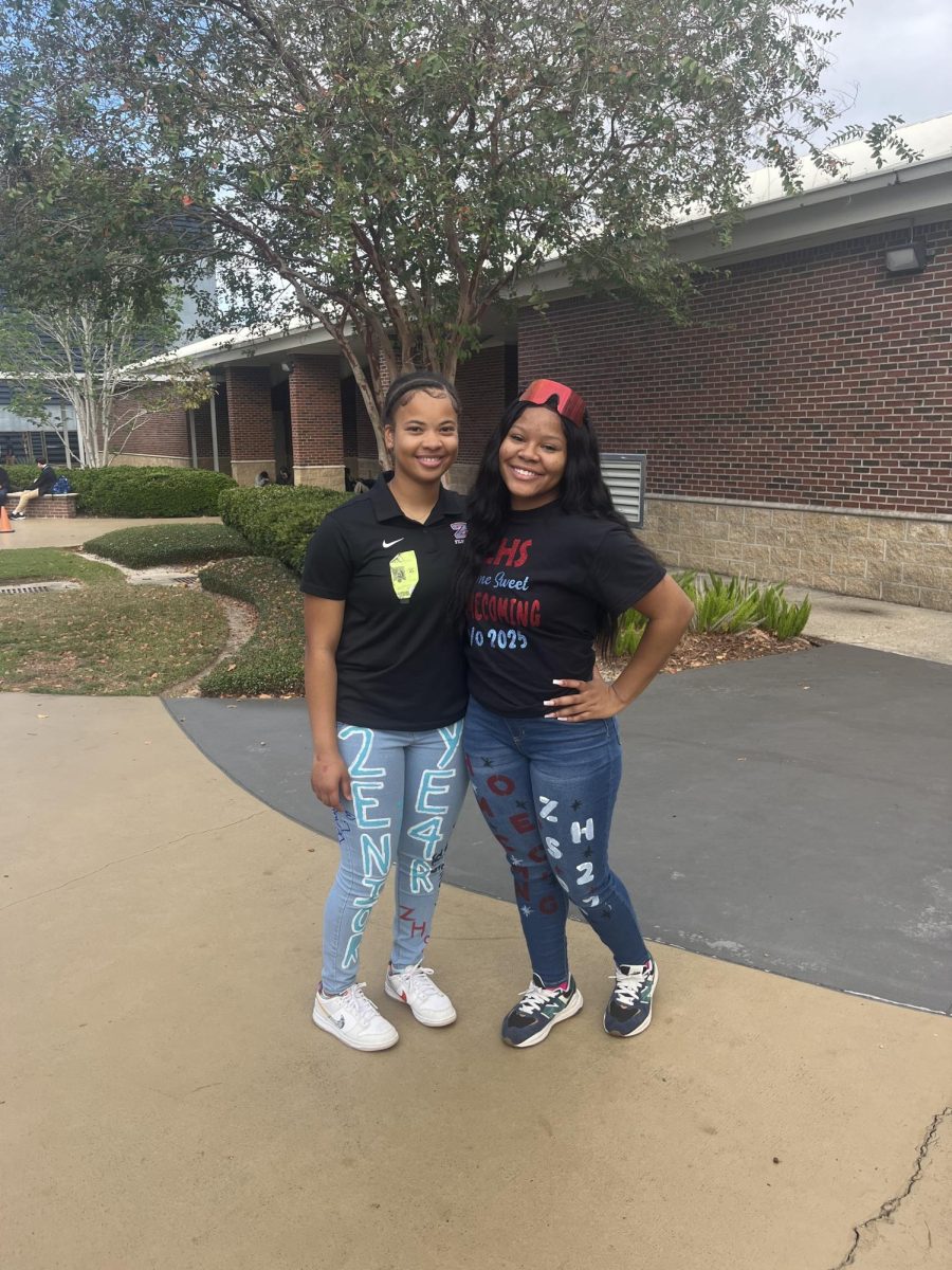 Honoring the school’s colors, Sa’nya Lawrence (12) and Savannah Franklin (11) painted their jeans to celebrate their senior year and homecoming week! 
