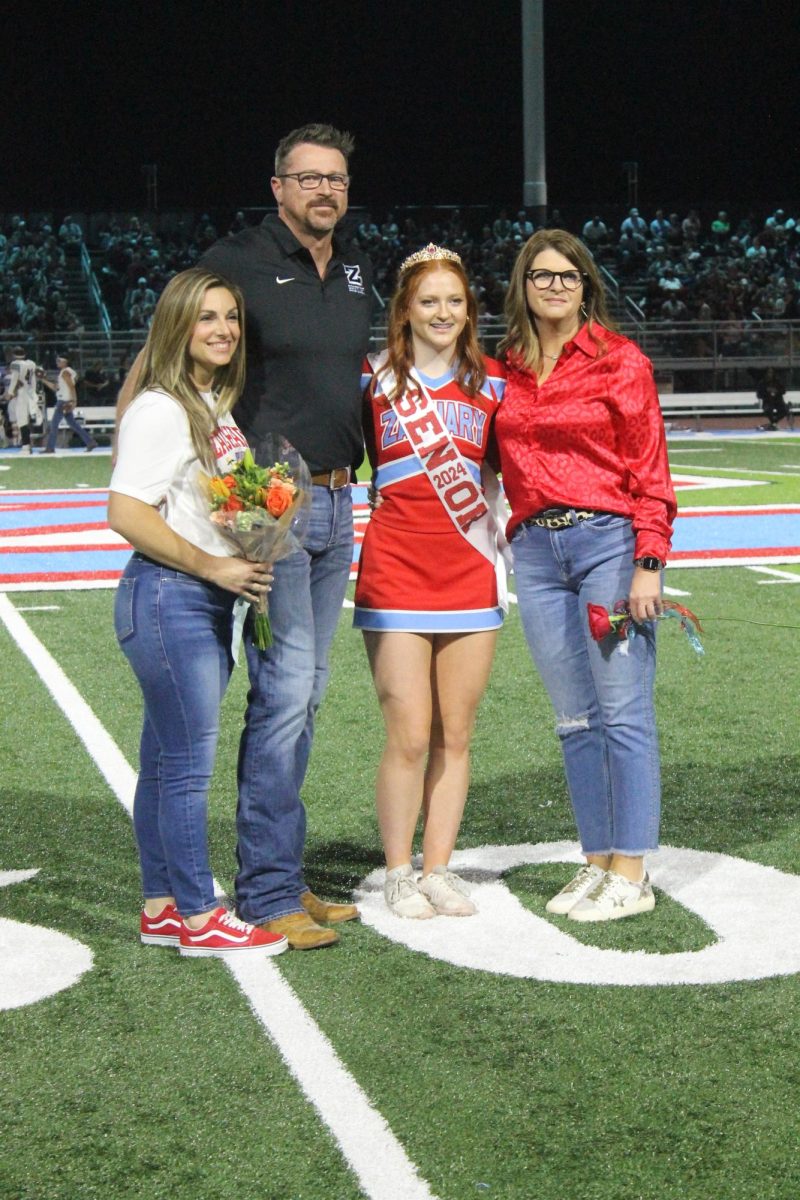 Blaire Bentley (12) is recognized as a member of the Varsity cheer team!