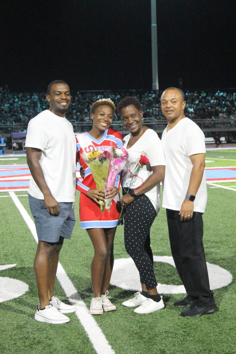 Alaishia Joseph (12) is recognized as a member of the Varisty cheer team!