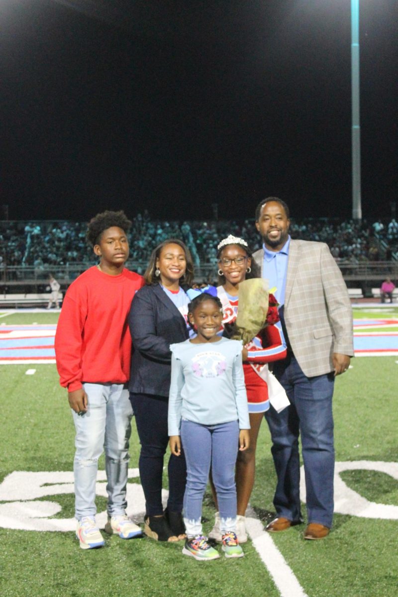 Alyvia Pierson (12) is recognized as a member of the Varisty cheer team!