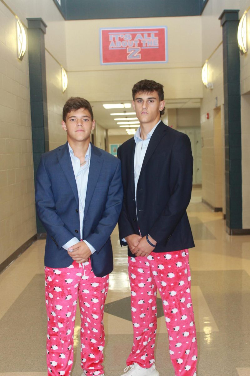 Twinning with their fellow players from the soccer and baseball team, Coleman Jaksic (11) and Conner Cresap (12) creatively dress half formally, half casually. 