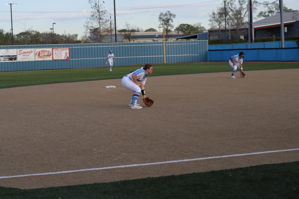 From left to right:
Audrey Mitchem(11) and Nyla Doiron (12) prepare to catch a grounder.