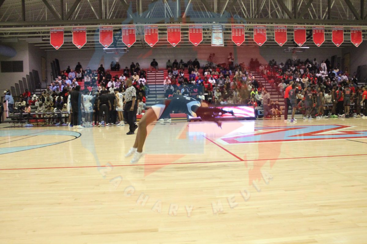 Journie Jackson (10) tumbles down the court during a Bronco timeout!