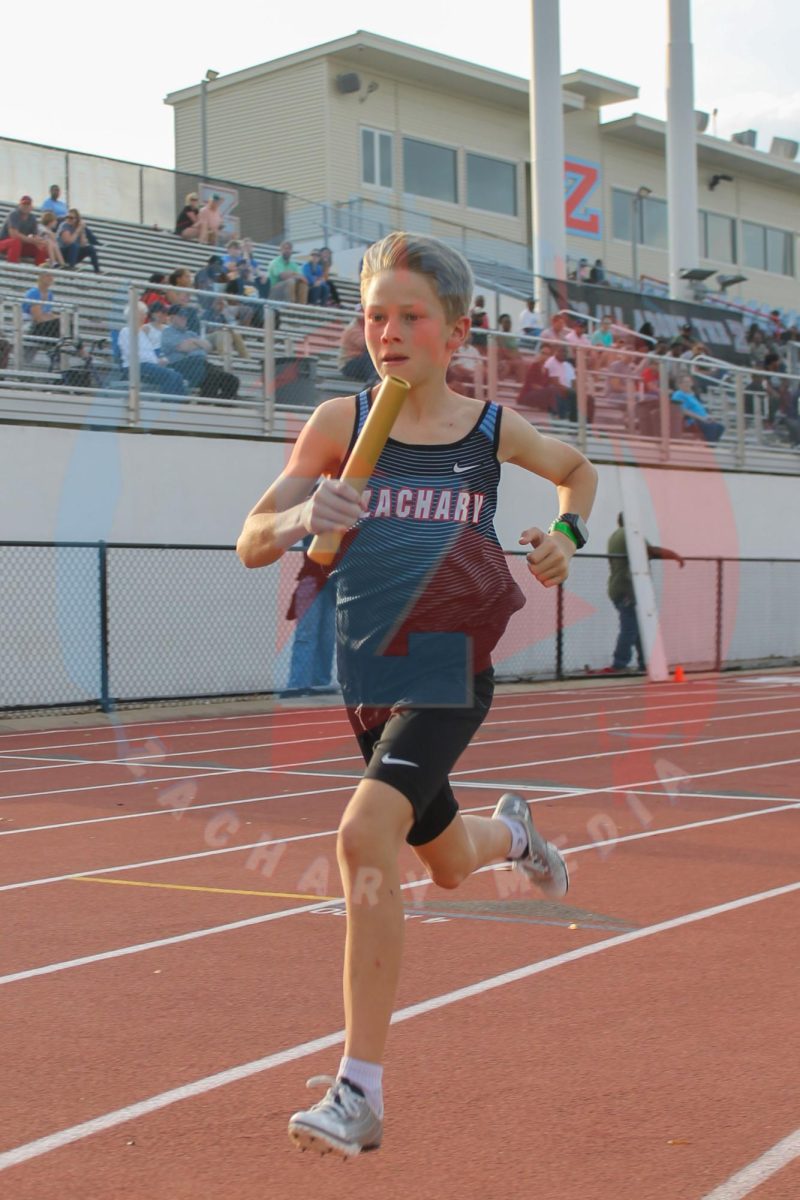 Carson Southall (9) runs in his first meet in the 4x800 relay race.