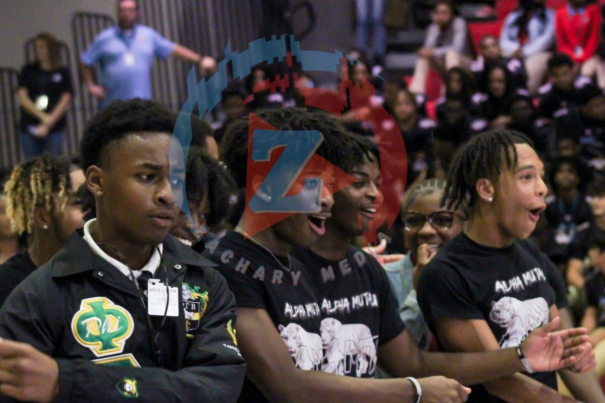 Jolon Harleaux (11) laughs with his friends. The memories students made at the pep rally will last a lifetime.