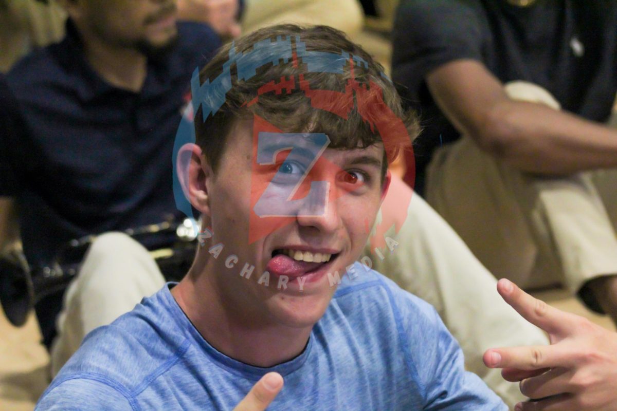 Ethan Nelson (12) poses for the camera. Nelson enjoyed his time at the pep rally as a band member.