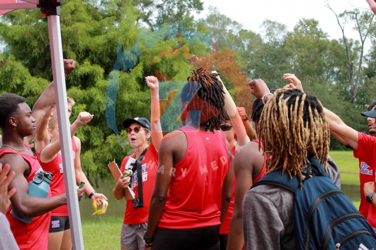 The team gathers together at a meet earlier in the season.