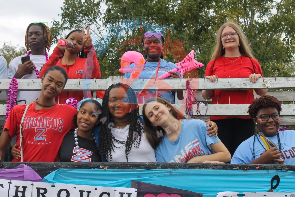 Students pose on the Sophomore class float.