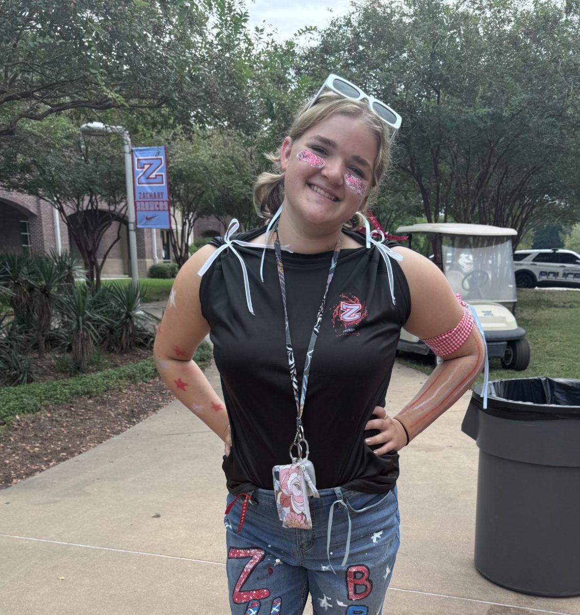 Libby Hughes (10) strikes a cute pose. She went all out with pigtails, sunglasses, and even face paint.