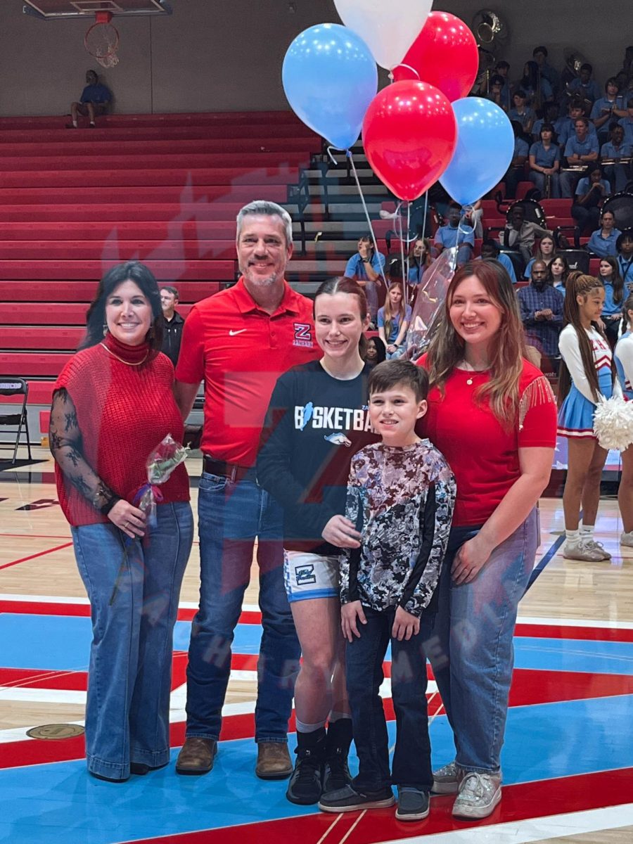 Resse Quibodeaux (12) with her family.