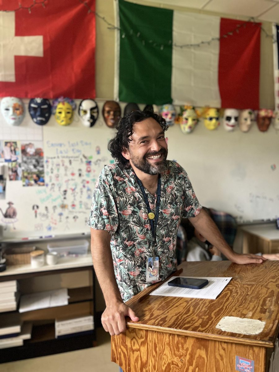 Adam Fevella teaches his class at the podium.