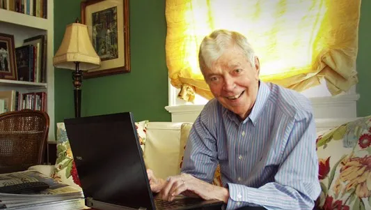 Legendary New Orleans sportswriter Peter Finney, sits on his couch at his home at 3025 Esplanade Ave.
